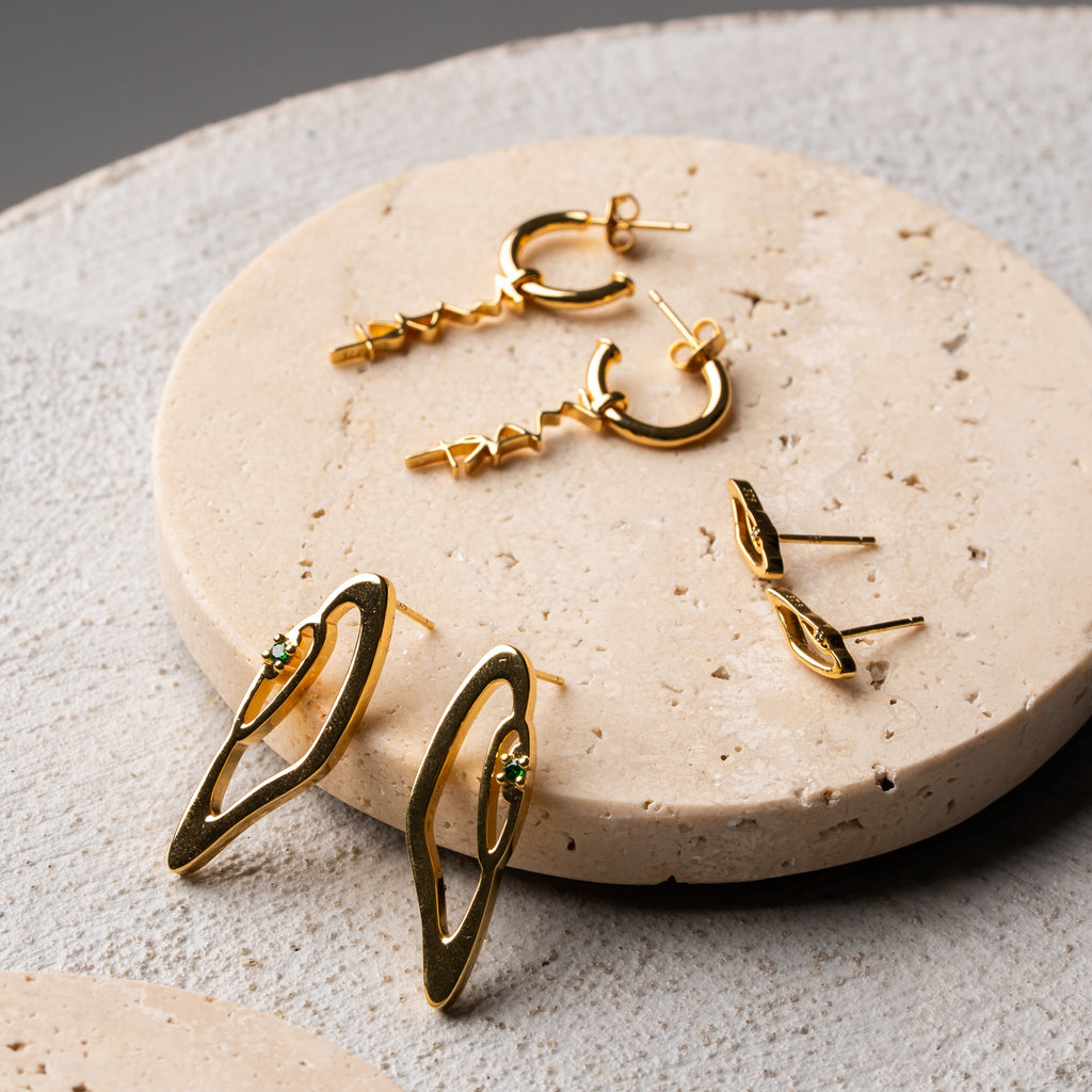 Gold mini eye stud earrings with green zircon stone, minimal design by AGUDO Studio