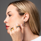 Gold mini eye stud earrings with green zircon stone, minimal design by AGUDO Studio